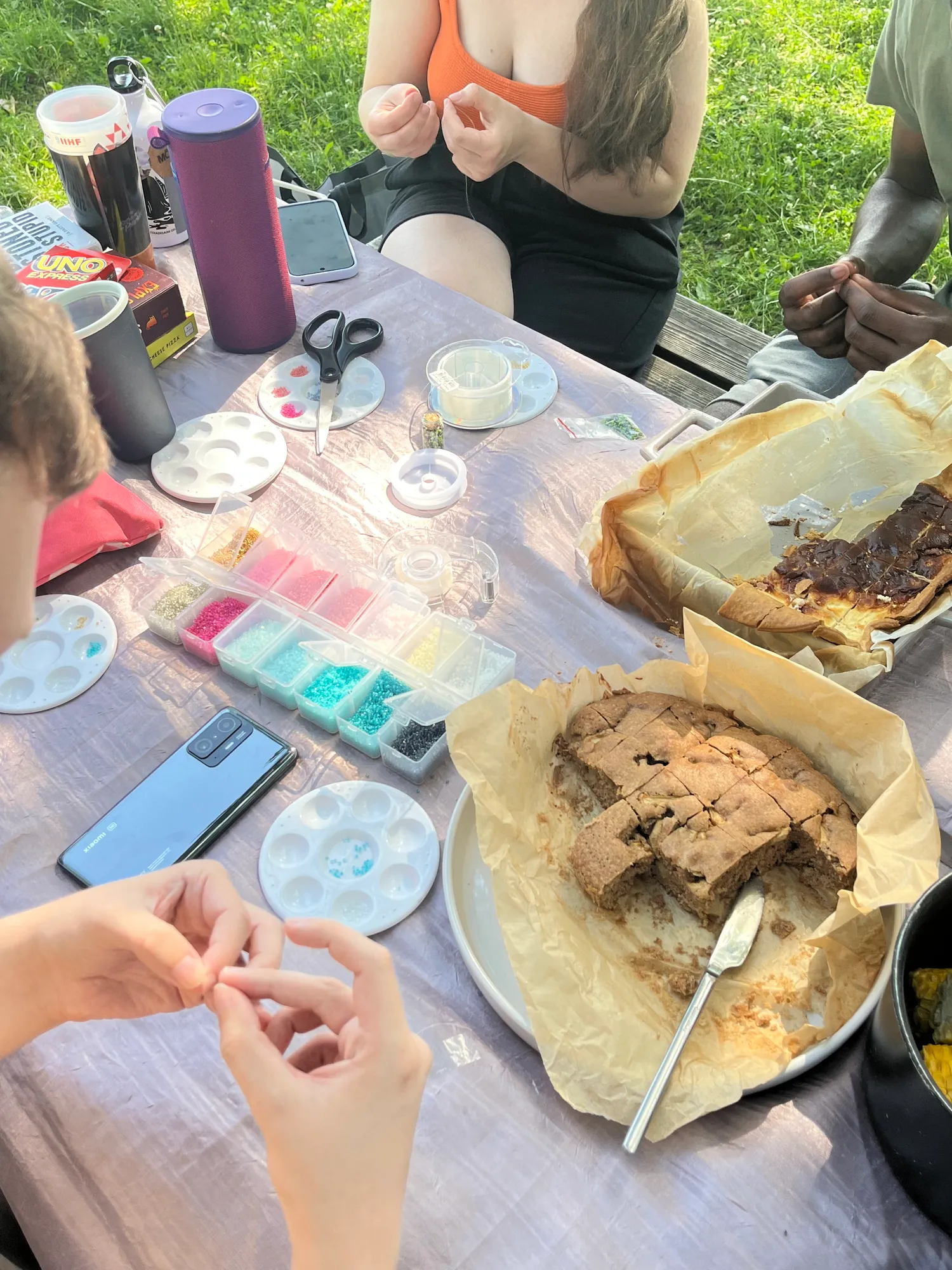 Creating bracelets while eating a homemade pie!